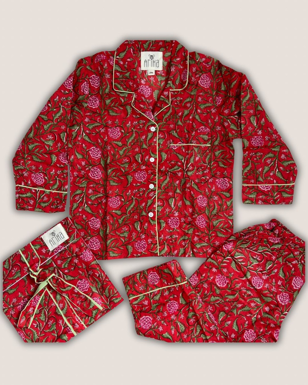 566-0198af35-d340-70ca-93ac-435082f68653.jpg Pijama 2T - Flores Rojas - Imagen 1